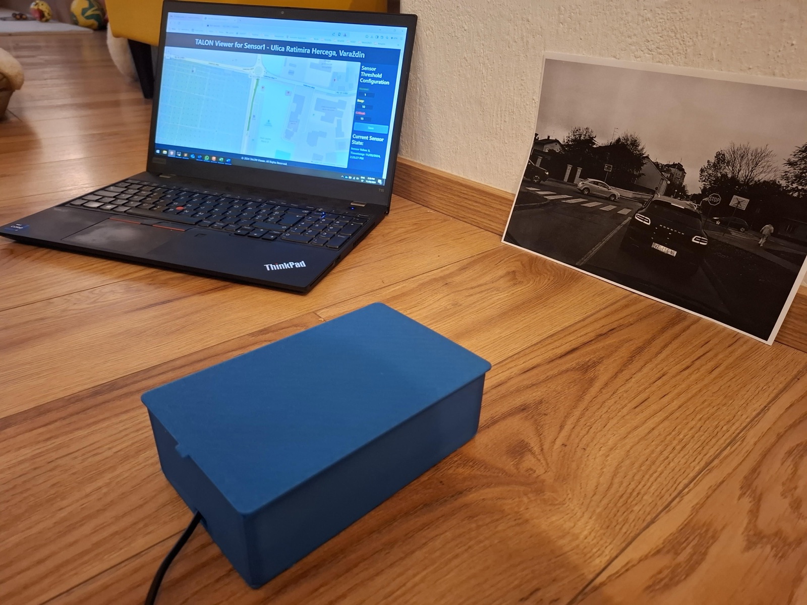The TALON traffic viewer beside the prototype enclosure and test street image.